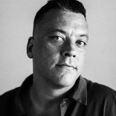 John J. Lennon headshot.